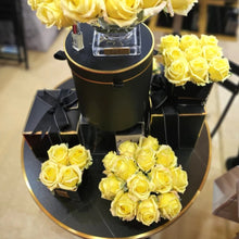 Load image into Gallery viewer, COUTURE PERFUMED NATURAL TOUCH 4 ROSES - SQUARE BLACK VASE GOLD &amp; YELLOW
